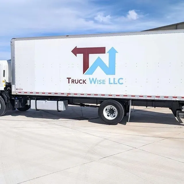 A truck with the company logo on it.
